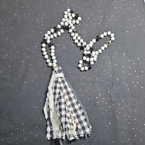 Chic Black and White Beaded Necklace with Tassel